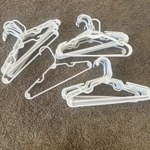 Set of White Plastic Hangers